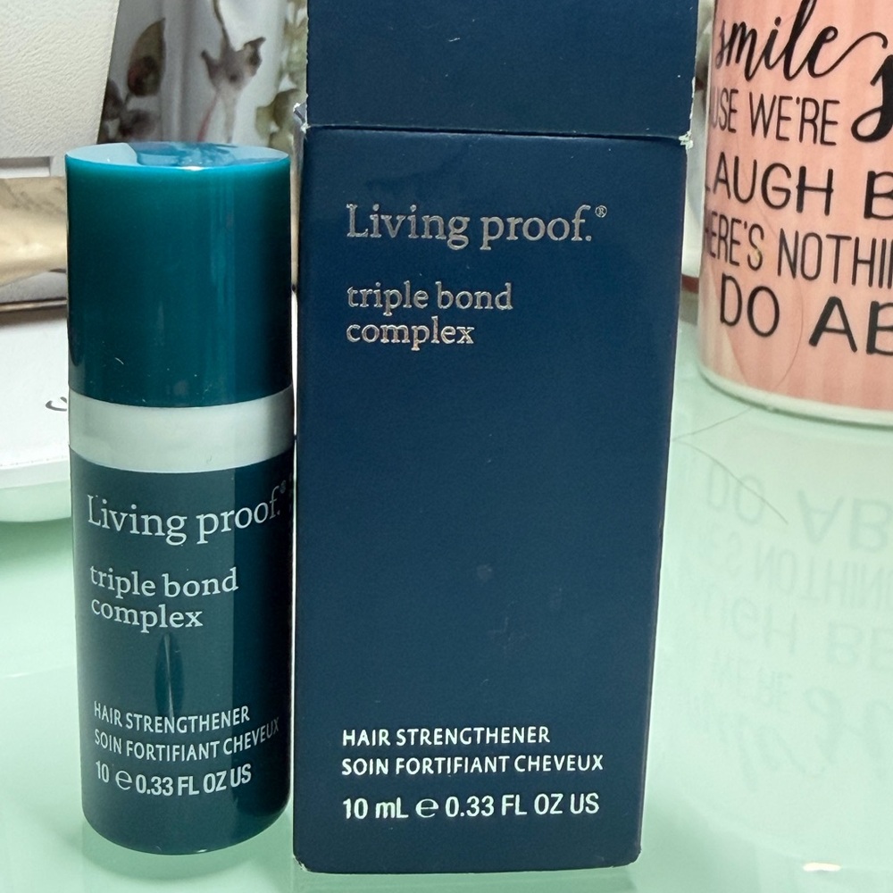 Living Proof Triple Bond Complex in Teal and White